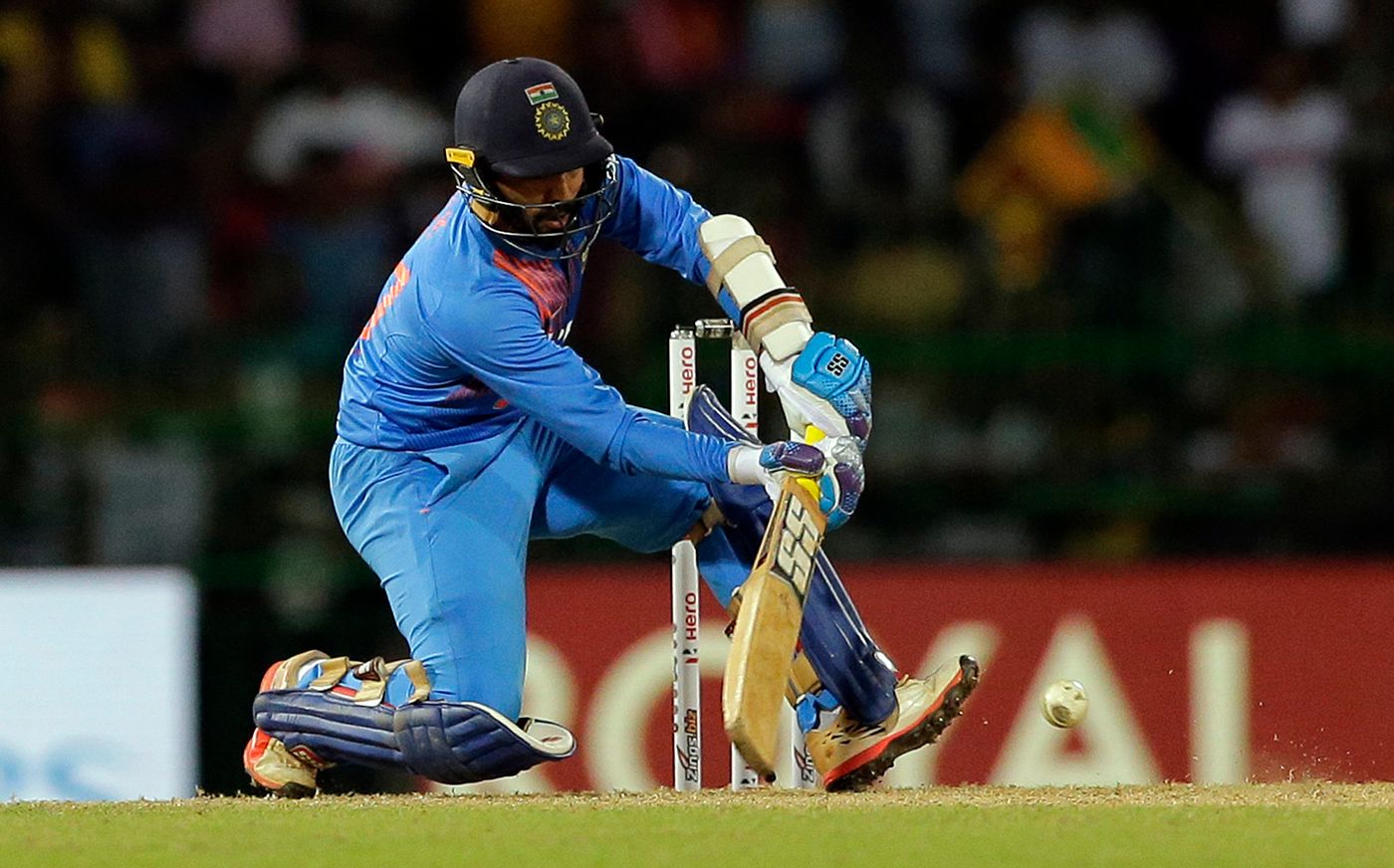 Image: Dinesh Karthik hitting the winning six with fireworks in the background
