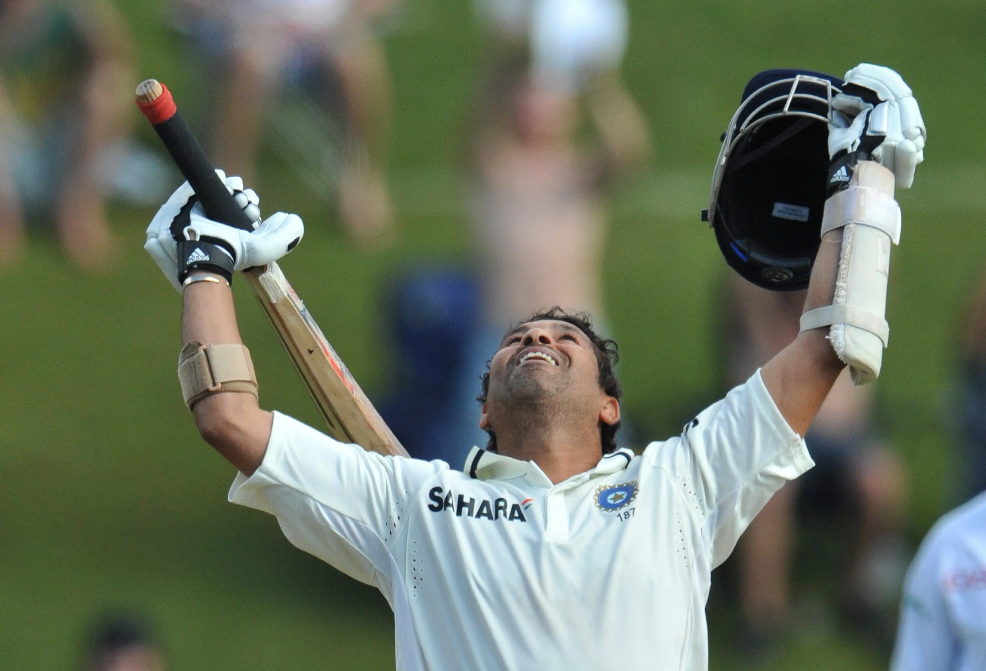 Image: Sachin Tendulkar raising his bat after scoring his double century against Bangladesh