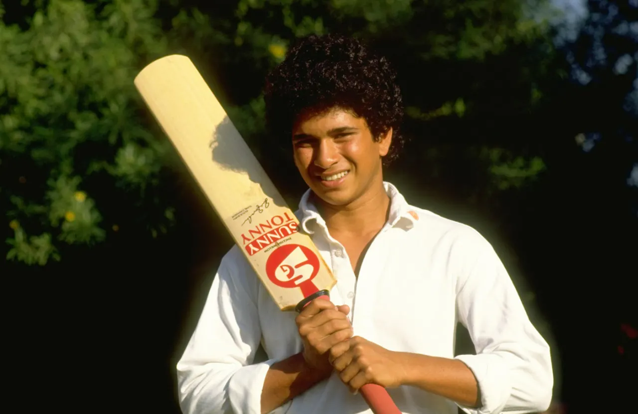 Young Sachin with his first cricket bat